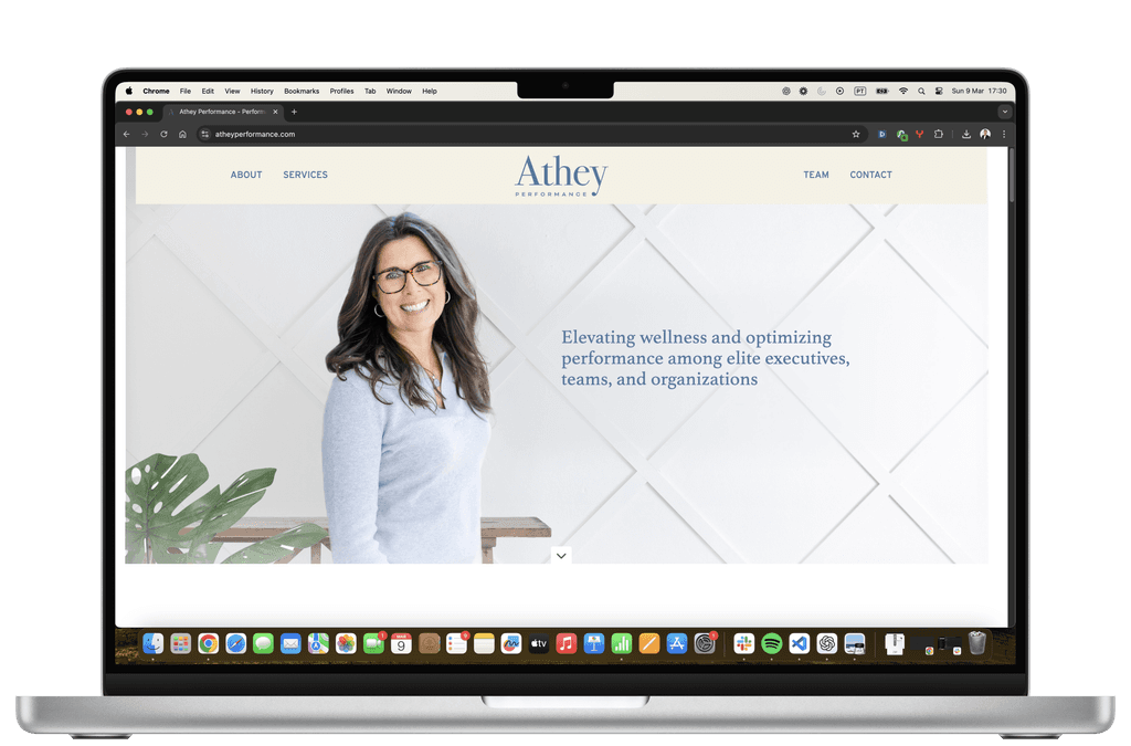 Athey Performance homepage on a laptop screen